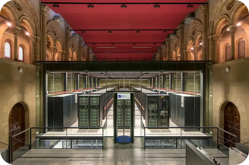 Longshot of a server room from the front showcasing the depth of servers.